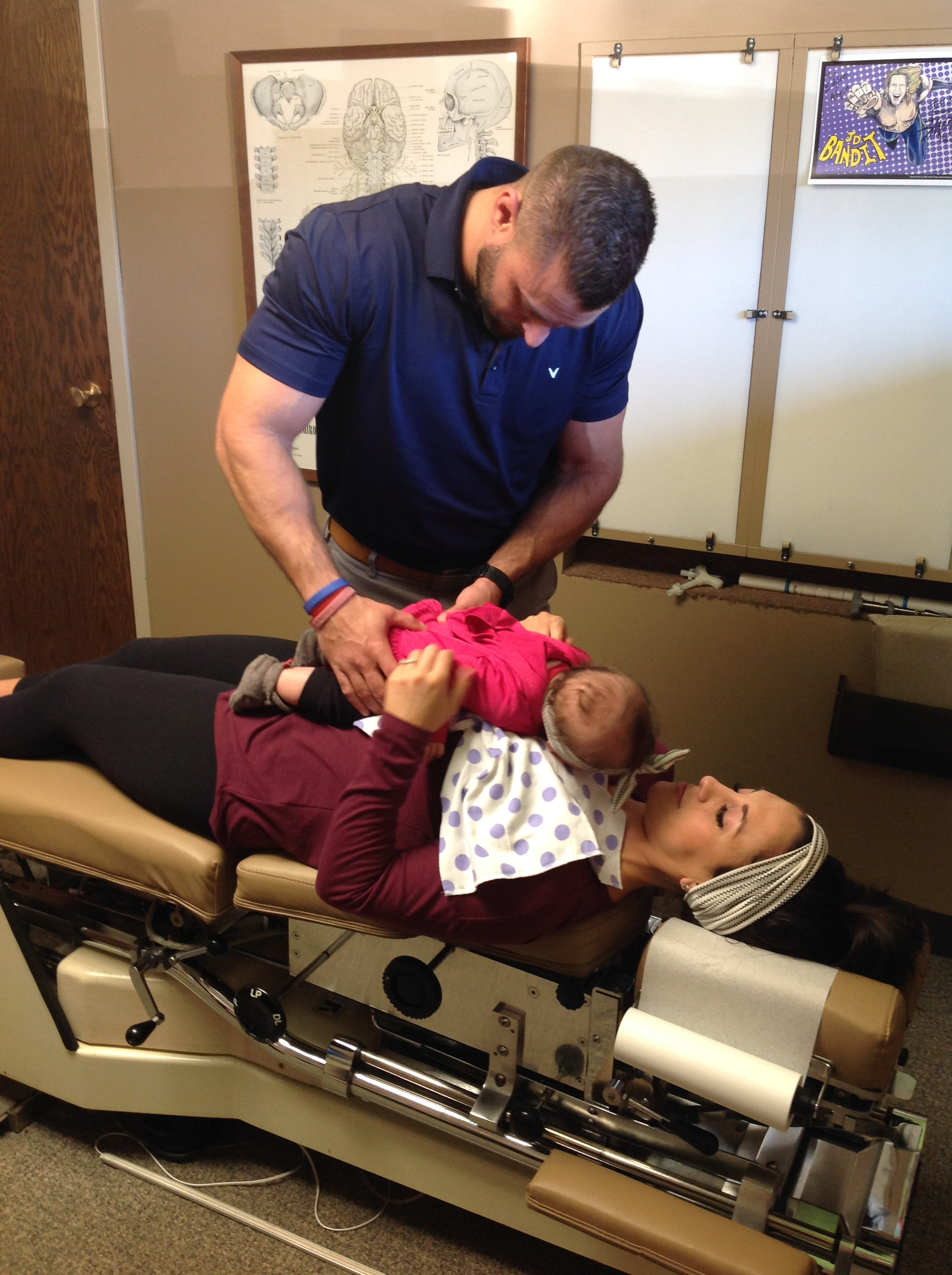 Eau Claire chiropractor adjusting a child